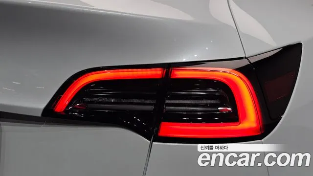 Tesla Model Y — Фото автомобиля 8