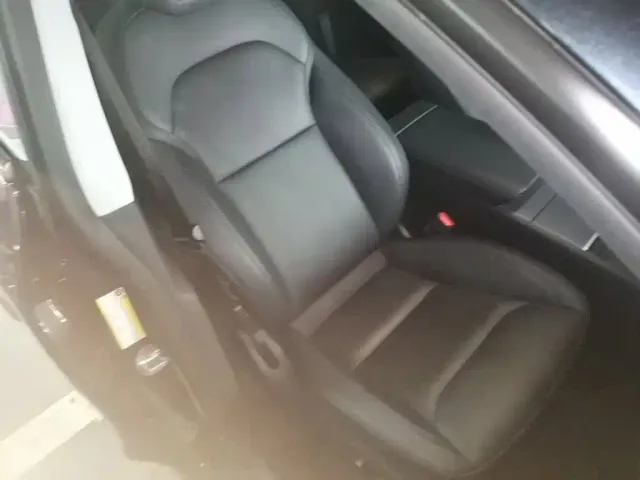 Tesla Model Y — Фото автомобиля 24