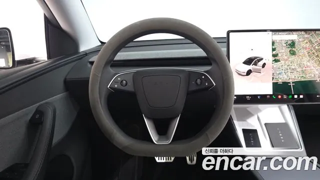 Tesla Model Y — Фото автомобиля 12