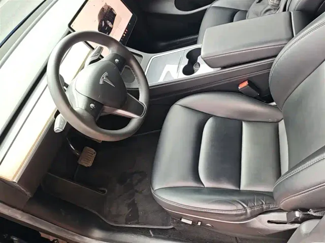 Tesla Model Y — Фото автомобиля 15