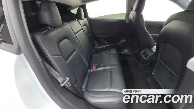 Tesla Model Y — Фото автомобиля 24