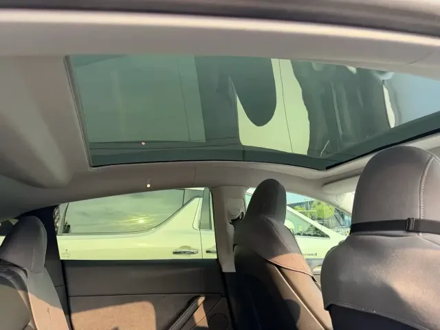 Tesla Model Y — Фото автомобиля 7