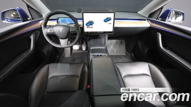 Tesla Model Y — Фото автомобиля 10