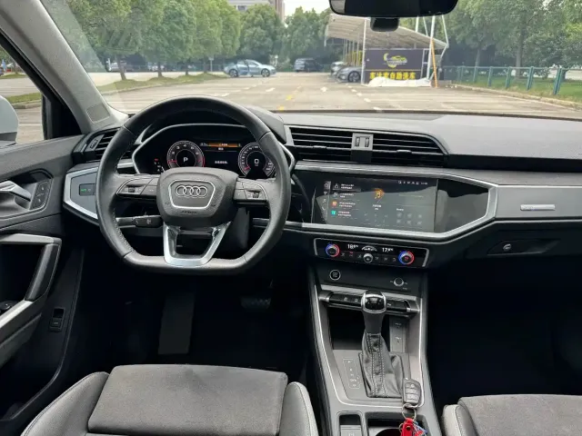 Audi Q3 — Фото автомобиля 11