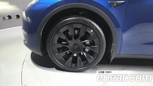 Tesla Model Y — Фото автомобиля 5