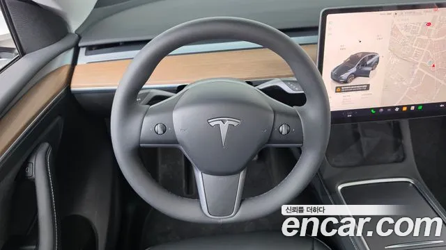 Tesla Model Y — Фото автомобиля 19