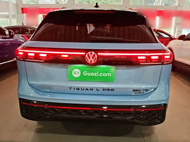 Volkswagen Tiguan L — Фото автомобиля 5
