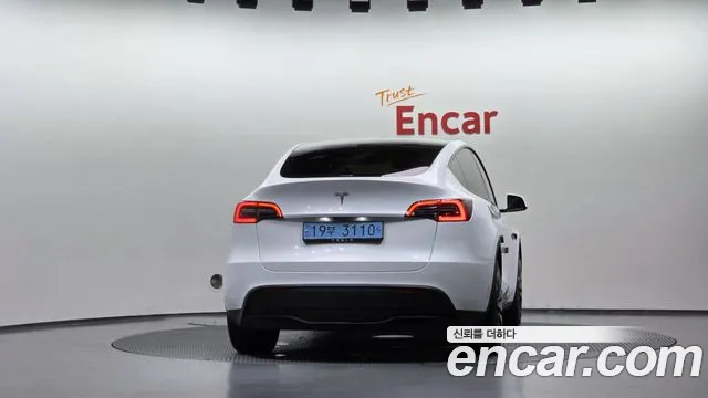 Tesla Model Y — Фото автомобиля 4