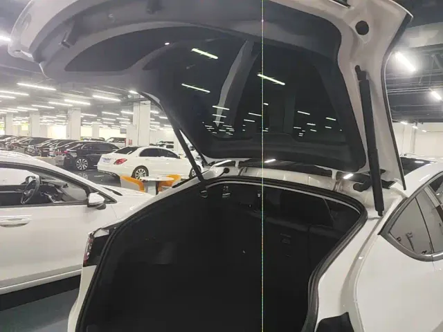 Tesla Model Y — Фото автомобиля 18