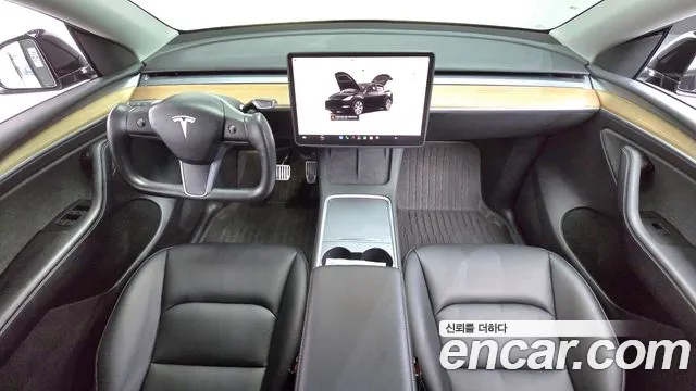 Tesla Model Y — Фото автомобиля 7