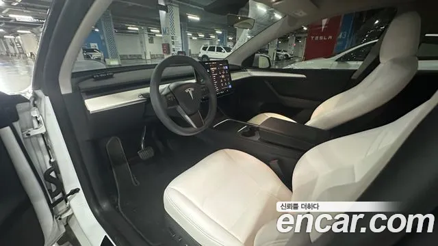 Tesla Model Y — Фото автомобиля 17