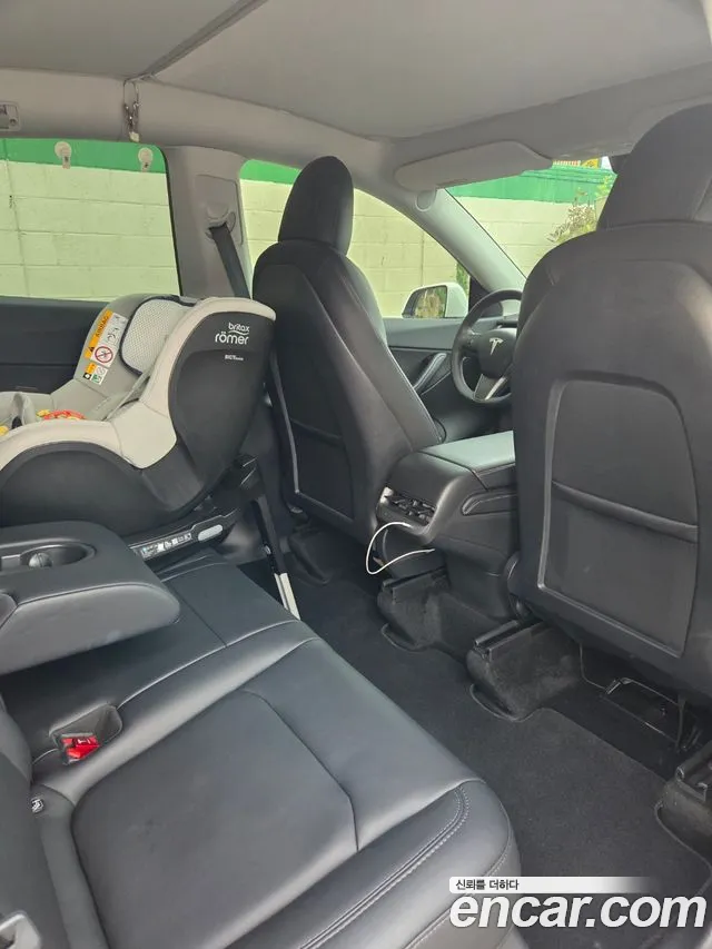Tesla Model Y — Фото автомобиля 10