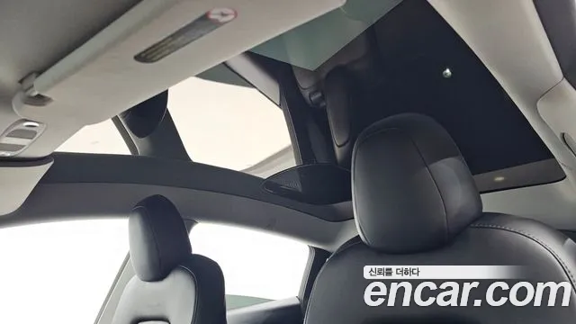 Tesla Model Y — Фото автомобиля 28
