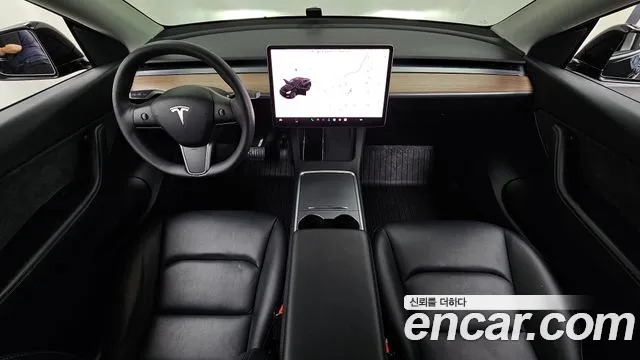 Tesla Model Y — Фото автомобиля 10
