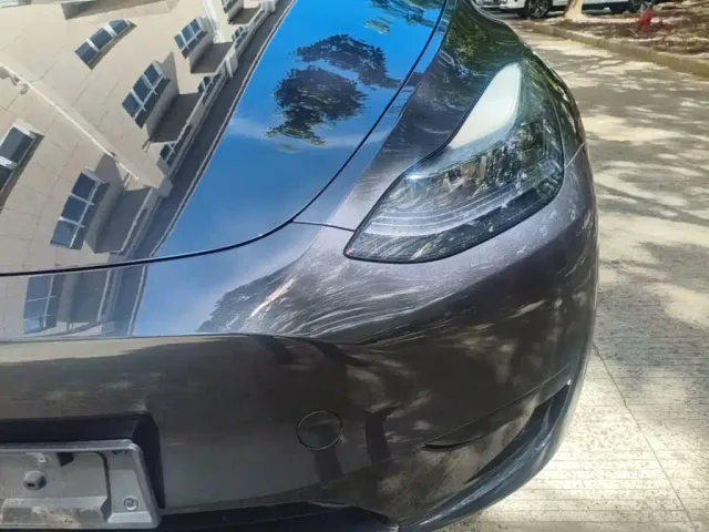 Tesla Model Y — Фото автомобиля 23