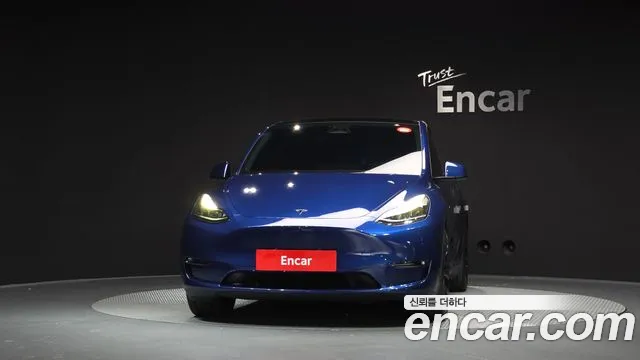 Tesla Model Y — Фото автомобиля 3