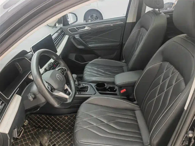 Volkswagen Tiguan L — Фото автомобиля 12