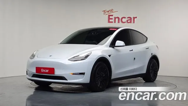 Tesla Model Y — Фото автомобиля 9