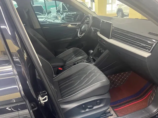 Volkswagen Tiguan L — Фото автомобиля 5