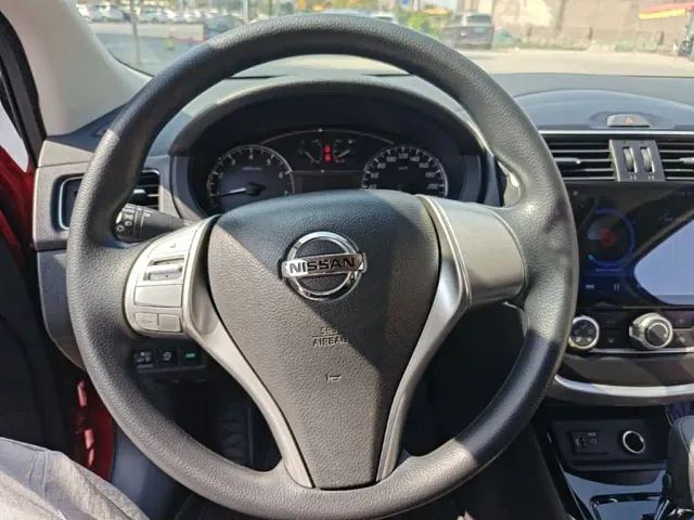 Nissan Tiida — Фото автомобиля 10