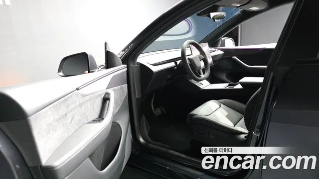 Tesla Model Y — Фото автомобиля 8