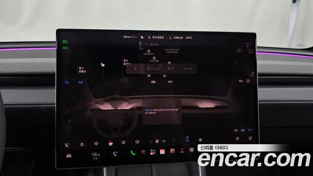 Tesla Model Y — Фото автомобиля 24