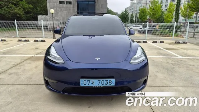Tesla Model Y — Фото автомобиля 3