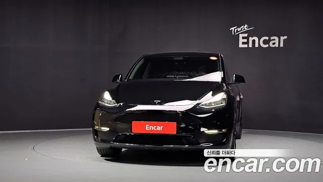 Tesla Model Y — Фото автомобиля 3