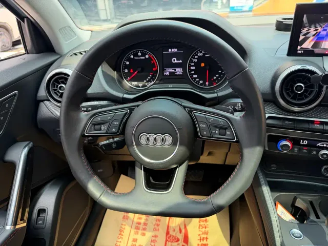 Audi Q2L — Фото автомобиля 13