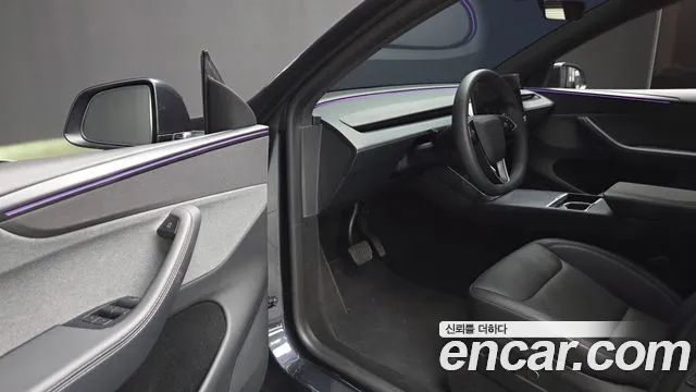 Tesla Model Y — Фото автомобиля 15