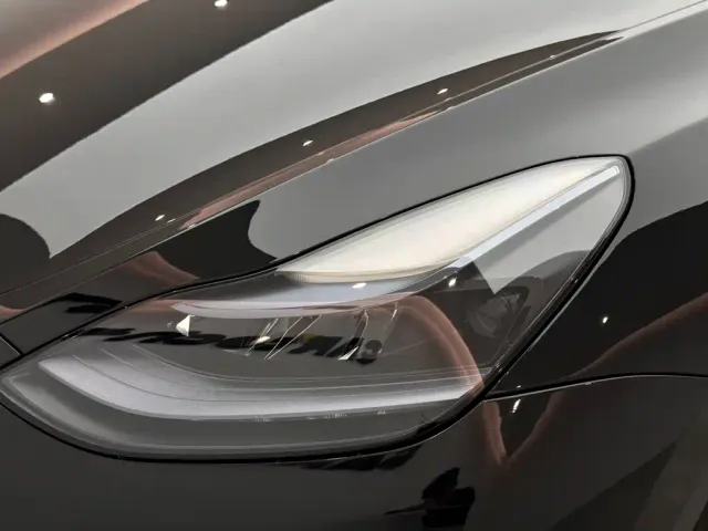 Tesla Model Y — Фото автомобиля 18