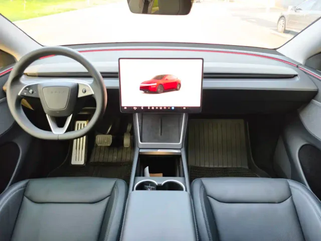 Tesla Model Y — Фото автомобиля 11