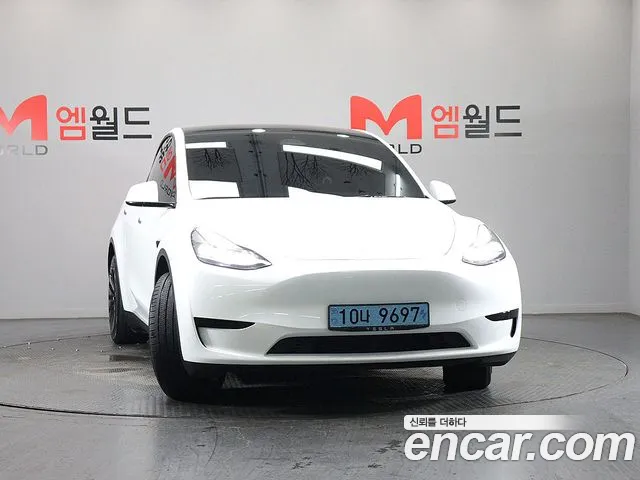 Tesla Model Y — Фото автомобиля 2