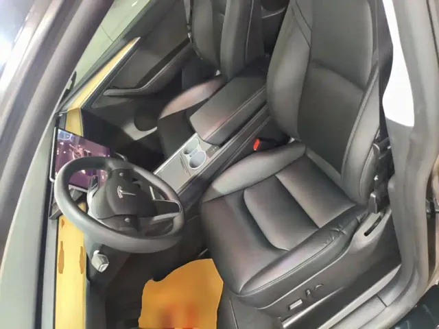 Tesla Model Y — Фото автомобиля 14