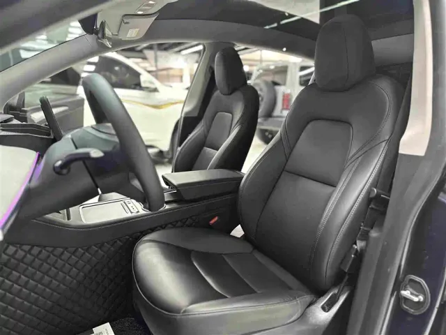 Tesla Model Y — Фото автомобиля 16