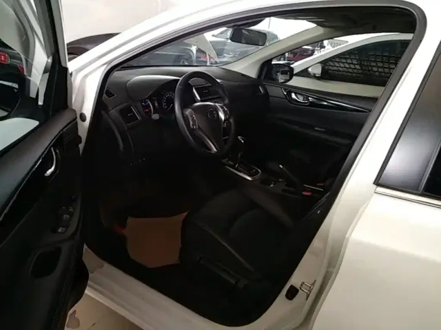 Nissan Tiida — Фото автомобиля 15