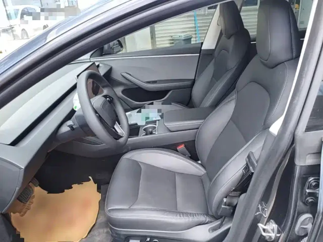 Tesla Model 3 — Фото автомобиля 14