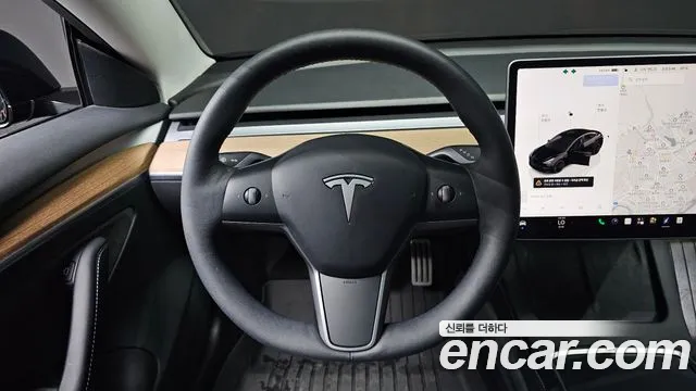 Tesla Model 3 — Фото автомобиля 11