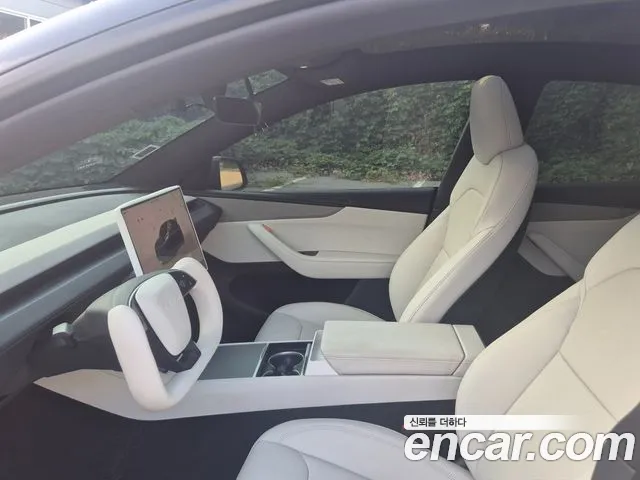 Tesla Model Y — Фото автомобиля 10