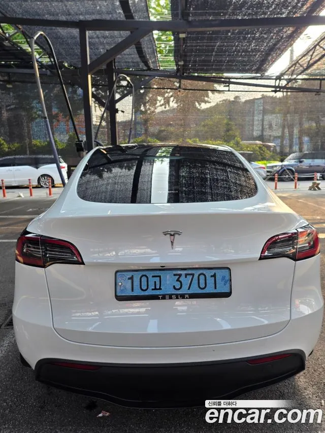 Tesla Model Y — Фото автомобиля 4