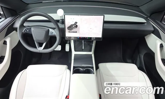 Tesla Model Y — Фото автомобиля 10
