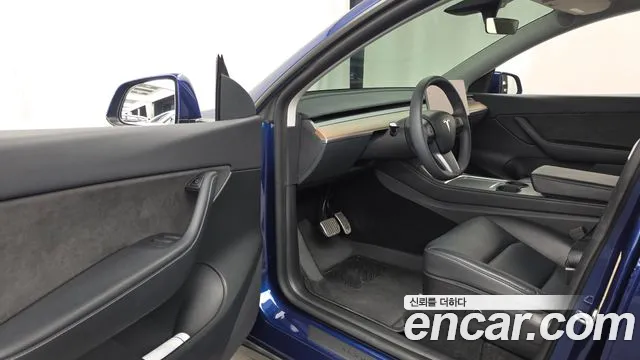 Tesla Model Y — Фото автомобиля 15