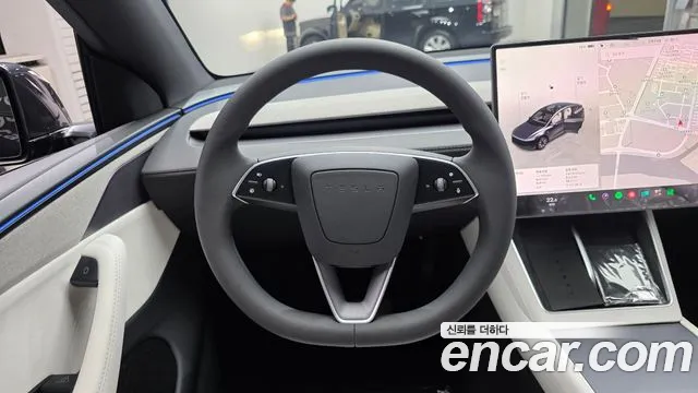 Tesla Model Y — Фото автомобиля 13