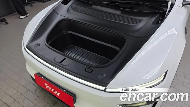 Tesla Model Y — Фото автомобиля 6