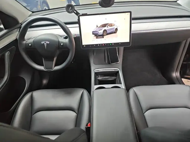 Tesla Model Y — Фото автомобиля 9