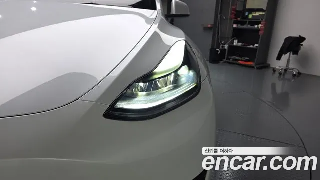 Tesla Model Y — Фото автомобиля 7
