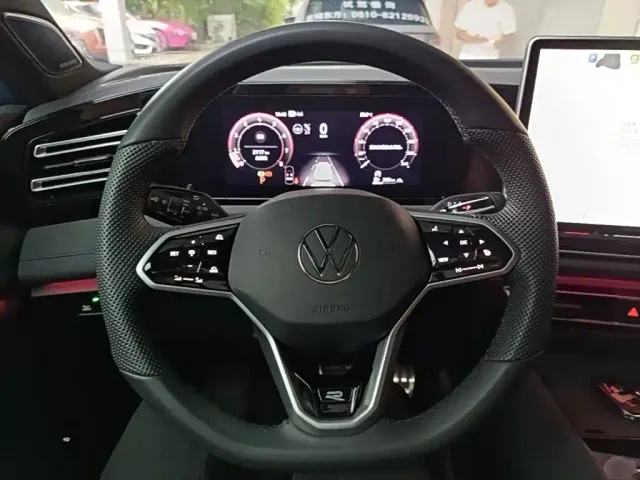 Volkswagen Tiguan L — Фото автомобиля 10