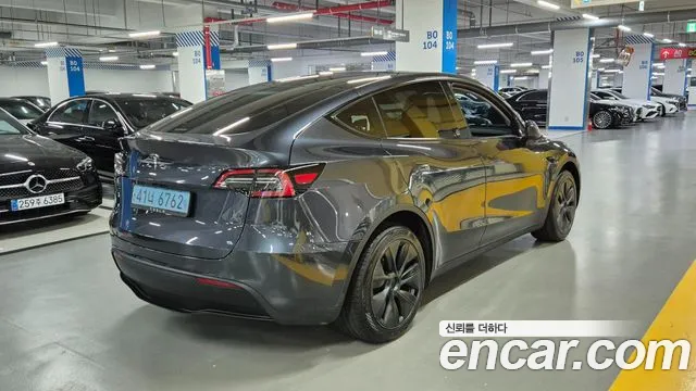 Tesla Model Y — Фото автомобиля 4