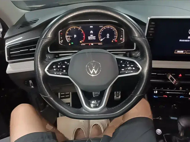 Volkswagen Tiguan L — Фото автомобиля 10