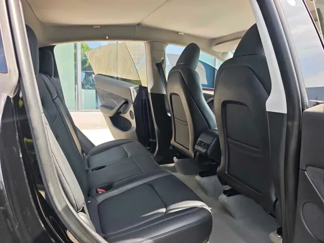 Tesla Model Y — Фото автомобиля 8